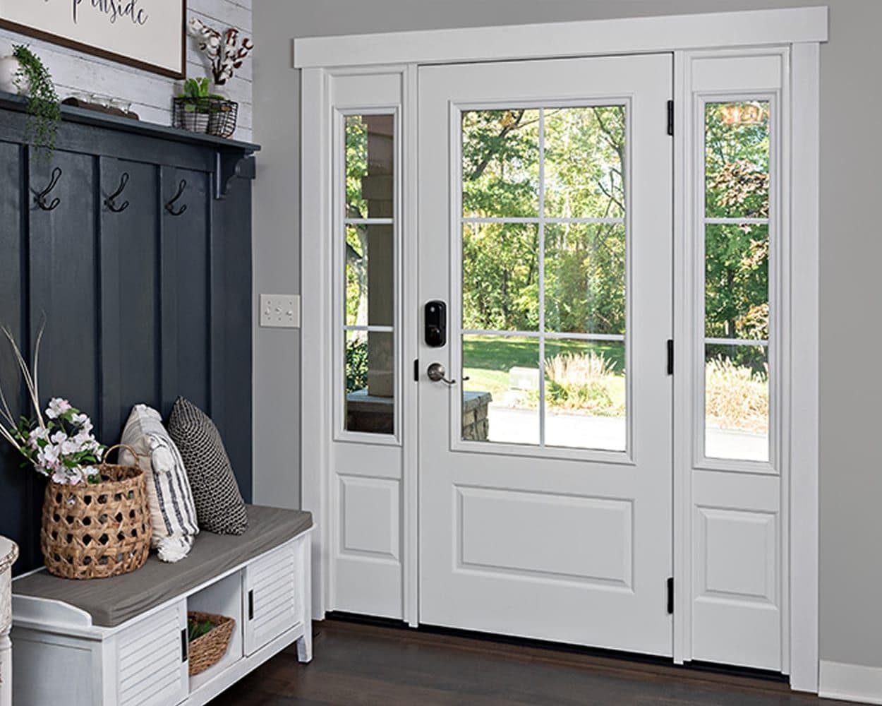 A ProVia entry door with sidelites, viewed from a styled foyer
