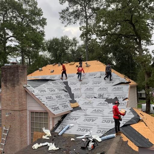 Freshly installed architectural asphalt shingles on a residential slope