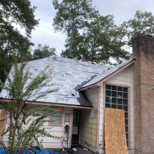 Close view of new architectural shingles and a clean ridge line